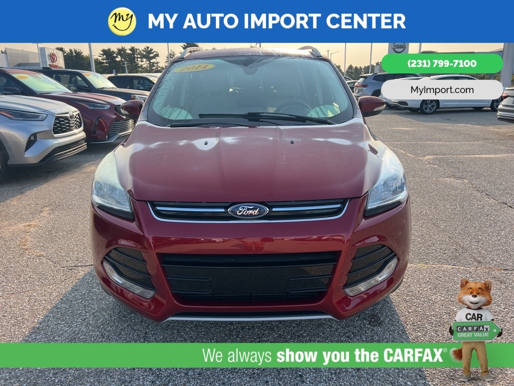 Used 2014 Ford Escape Titanium with VIN 1FMCU9J90EUA61492 for sale in Muskegon, MI