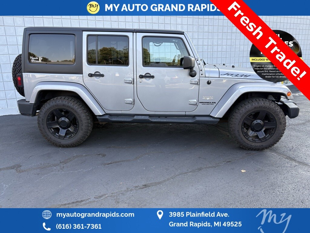 2014 Jeep Wrangler Unlimited Sahara photo 2