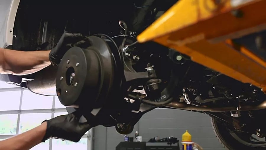 Subaru technician repairing axels