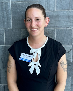 Staff member Mercedes Tharp from ID_0ae815ec814c