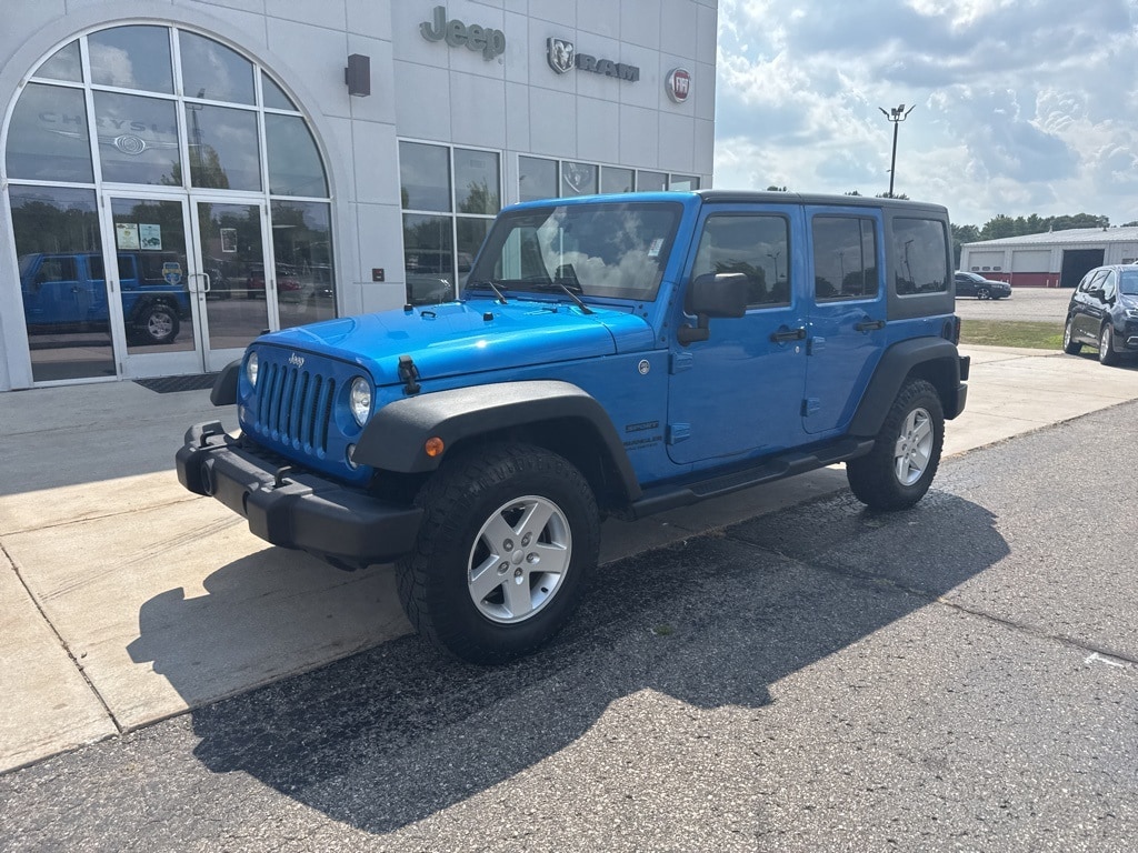 Used 2015 Jeep Wrangler Unlimited Sport with VIN 1C4BJWDG8FL770325 for sale in Mount Pleasant, MI