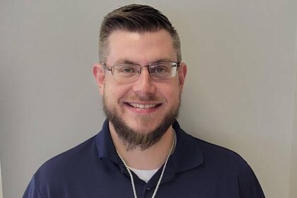 Staff member Ethan "Cord" Harvey from 6c3eec8fa9c5