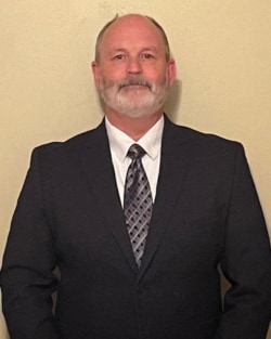 Staff member Mark Mawer from ID_41eda7570610