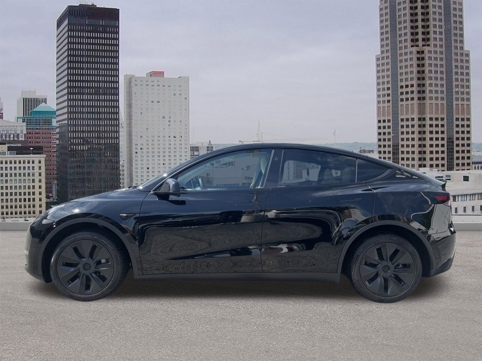 Used 2025 Tesla Model Y Long Range with VIN 7SAYGDEE5SA344972 for sale in Decatur, GA