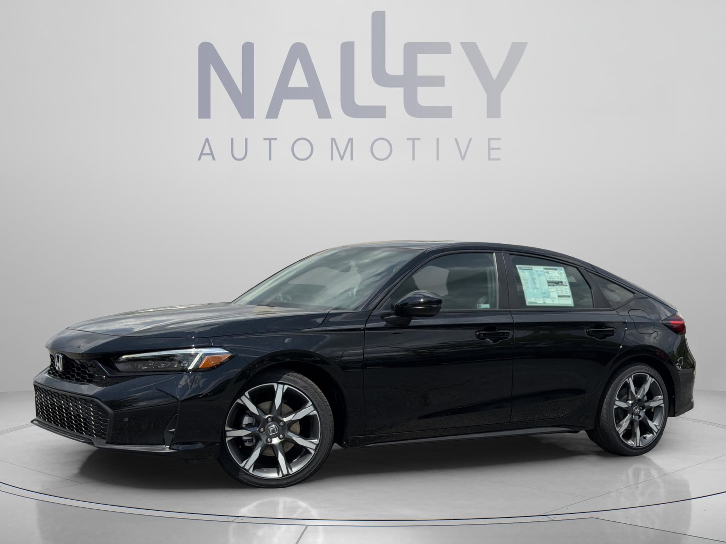 2026 Honda Civic Sport Touring Hybrid CVT's photo