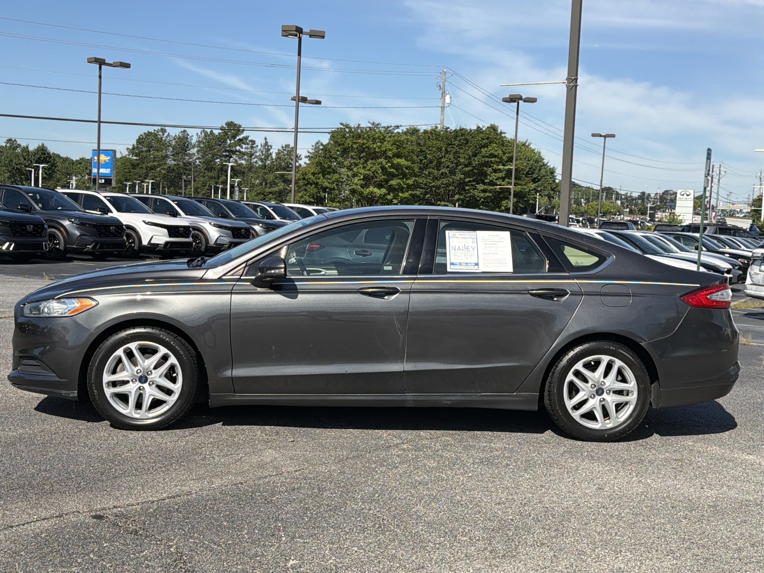 Used 2015 Ford Fusion SE with VIN 3FA6P0H77FR273992 for sale in Union City, GA