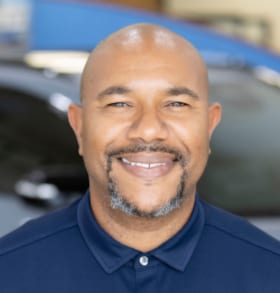 Staff member Maliik Tooley from ID_a7c5440b0dce