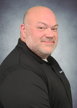 Staff member Brian Bennett  from ID_0aa86890f076