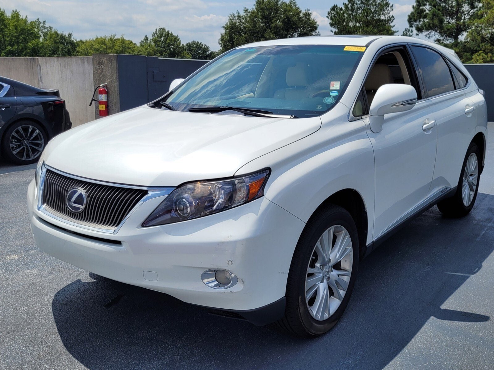 Used 2012 Lexus RX 450h with VIN JTJZB1BA1C2406811 for sale in Roswell, GA