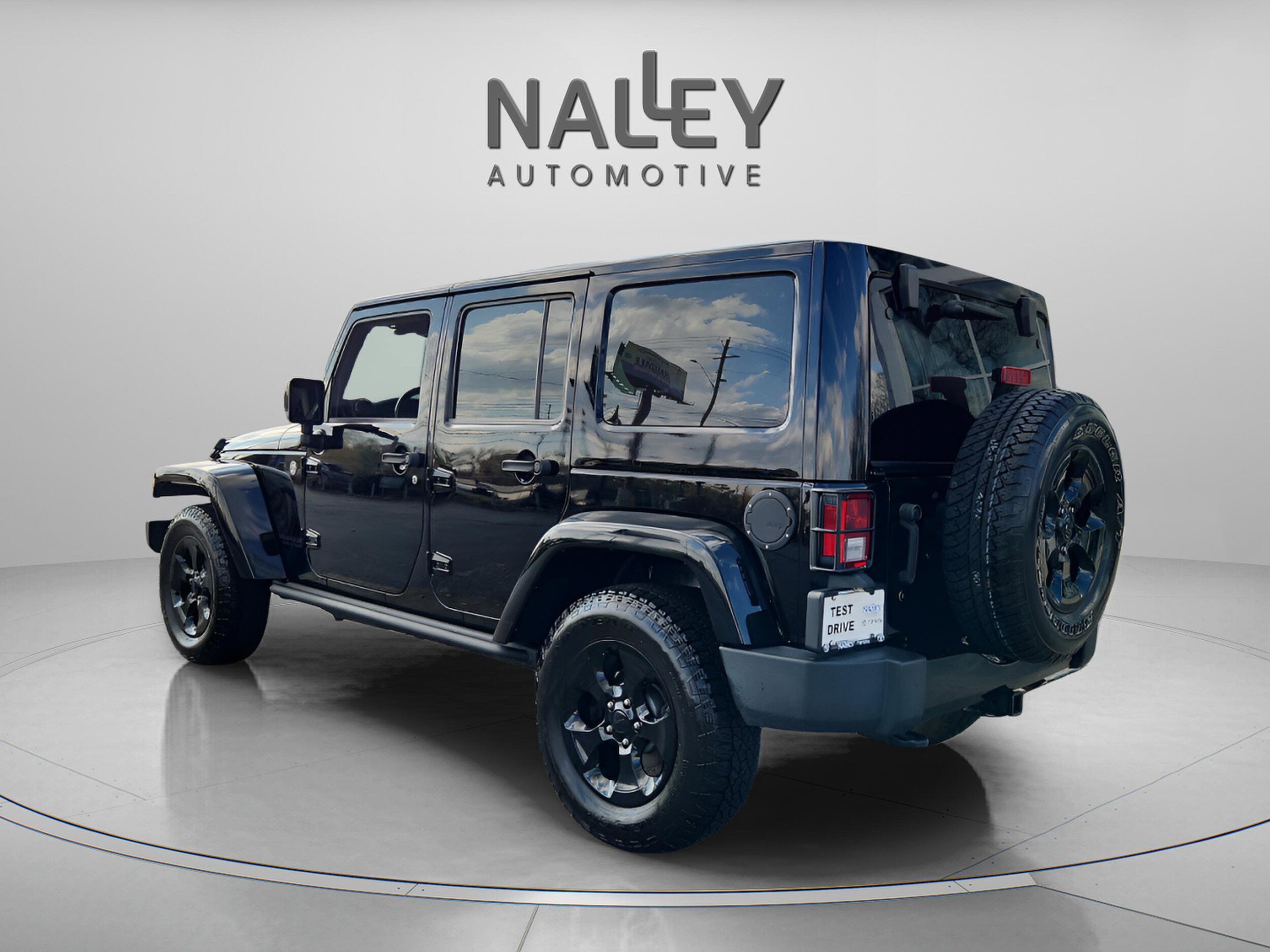 2015 Jeep Wrangler Unlimited Altitude photo 3