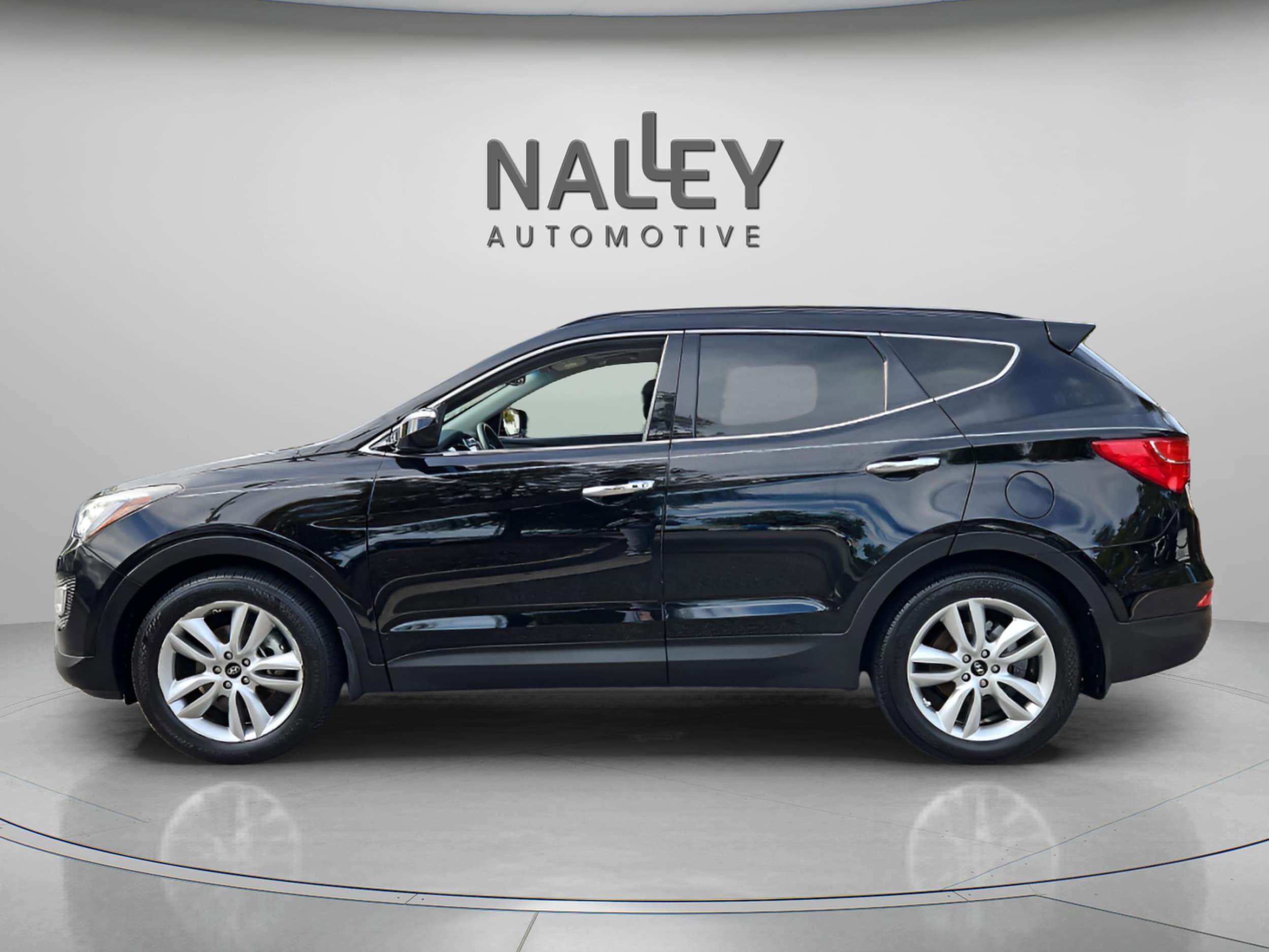 Used 2016 Hyundai Santa Fe Sport 2.0T with VIN 5XYZWDLA9GG325476 for sale in Roswell, GA