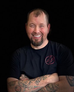 Staff member Tommy Collum from ID_f3b67c62f5d7