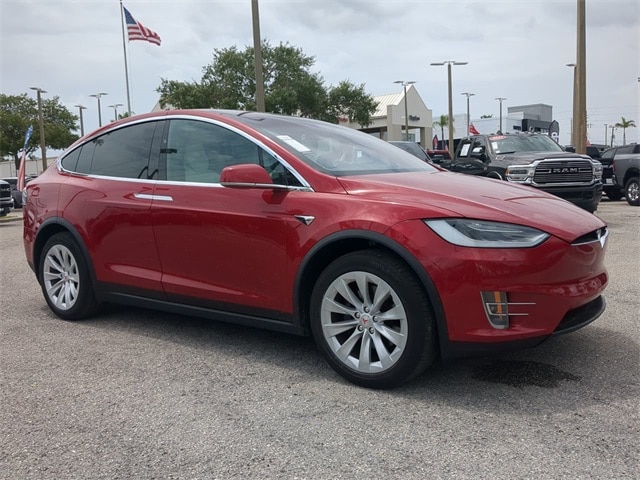 Used 2018 Tesla Model X 100D with VIN 5YJXCAE25JF121082 for sale in Naples, FL