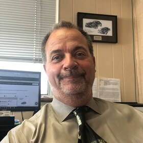 Staff member Gene Kennedy from 1bf5ddc1fd35