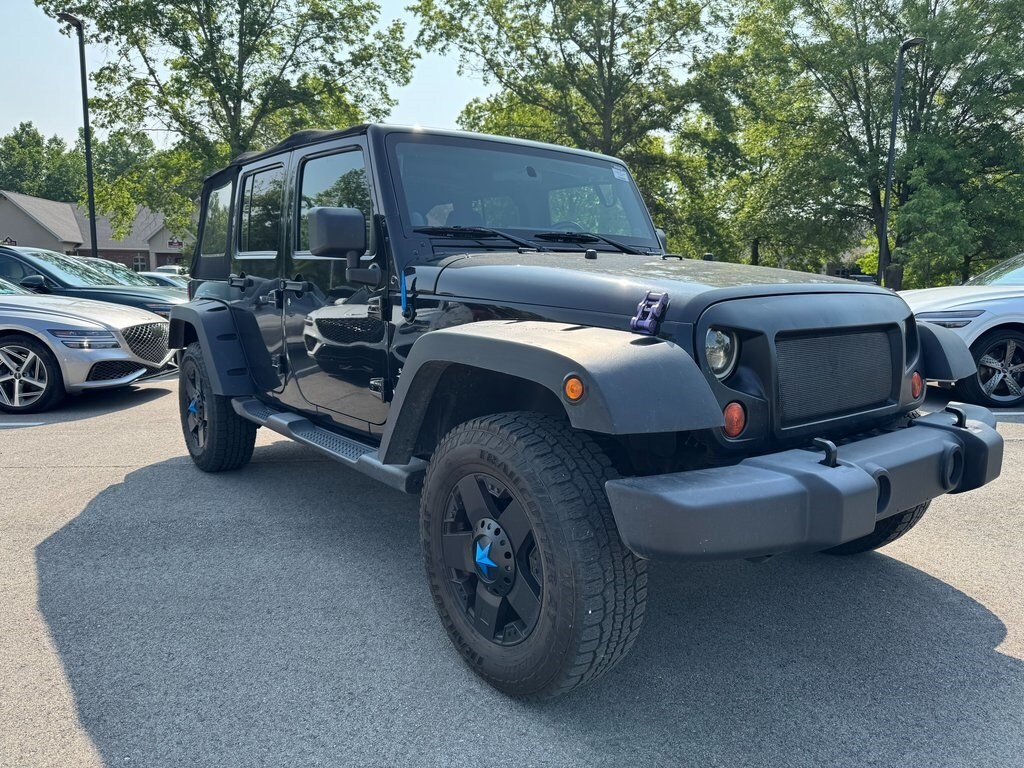 Used 2012 Jeep Wrangler Unlimited Sahara with VIN 1C4BJWEG5CL168038 for sale in Indianapolis, IN