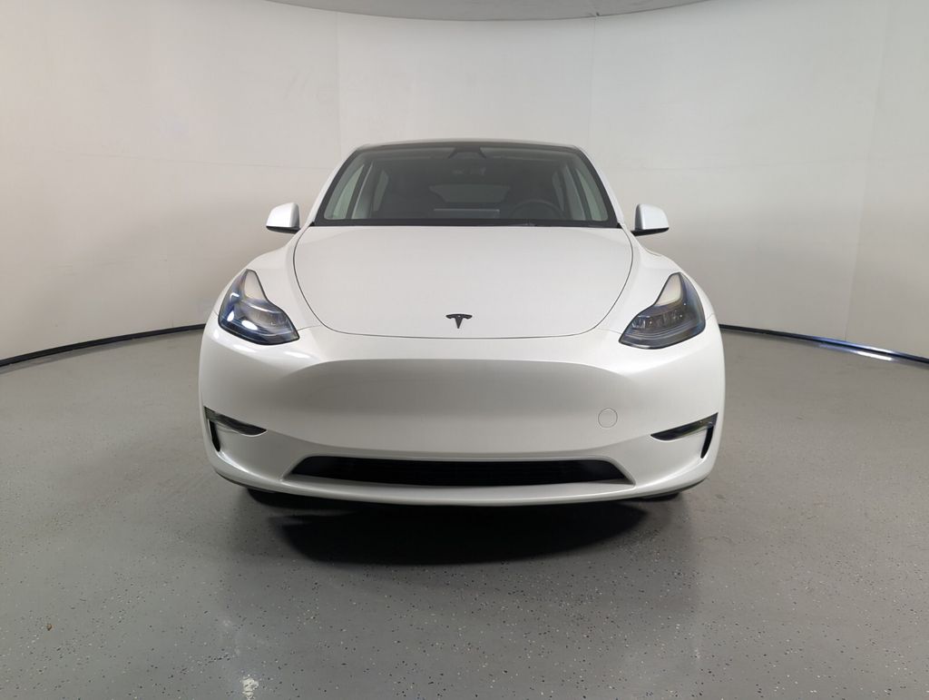 Used 2023 Tesla Model Y Base with VIN 7SAYGDED6PF957328 for sale in Palm Beach Gardens, FL