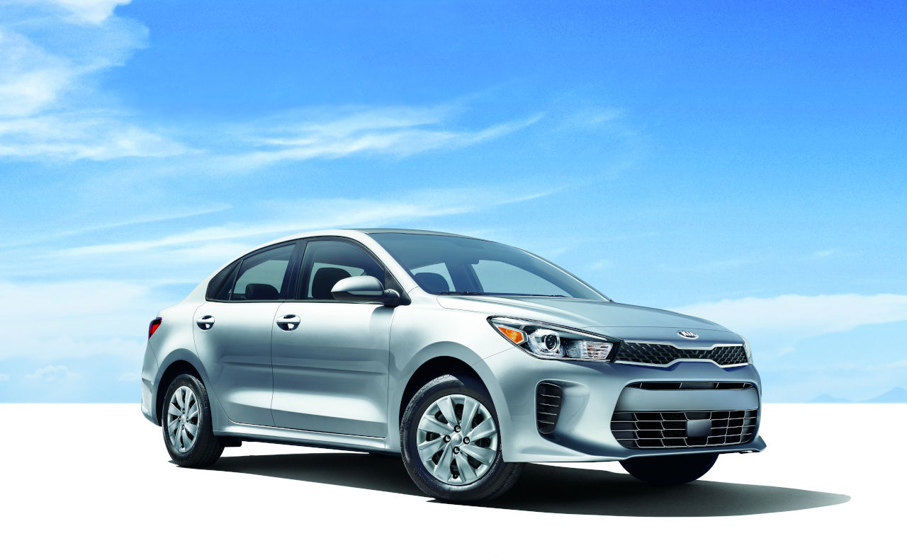 2019 Kia Rio Compact Sedan New Kia Rio In Bright Desert with a Blue Sky
