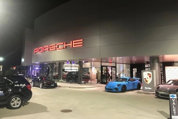 Napleton Westmont Porsche dealership entrance at night
