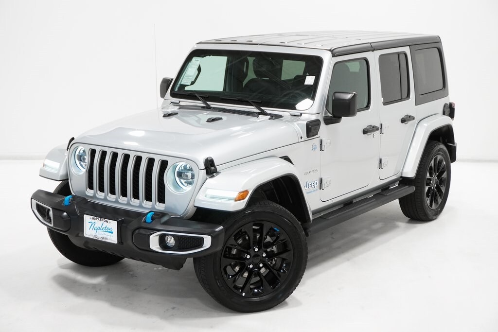 Used 2023 Jeep Wrangler 4xe Sahara 4XE with VIN 1C4JJXP69PW660999 for sale in Arlington Heights, IL