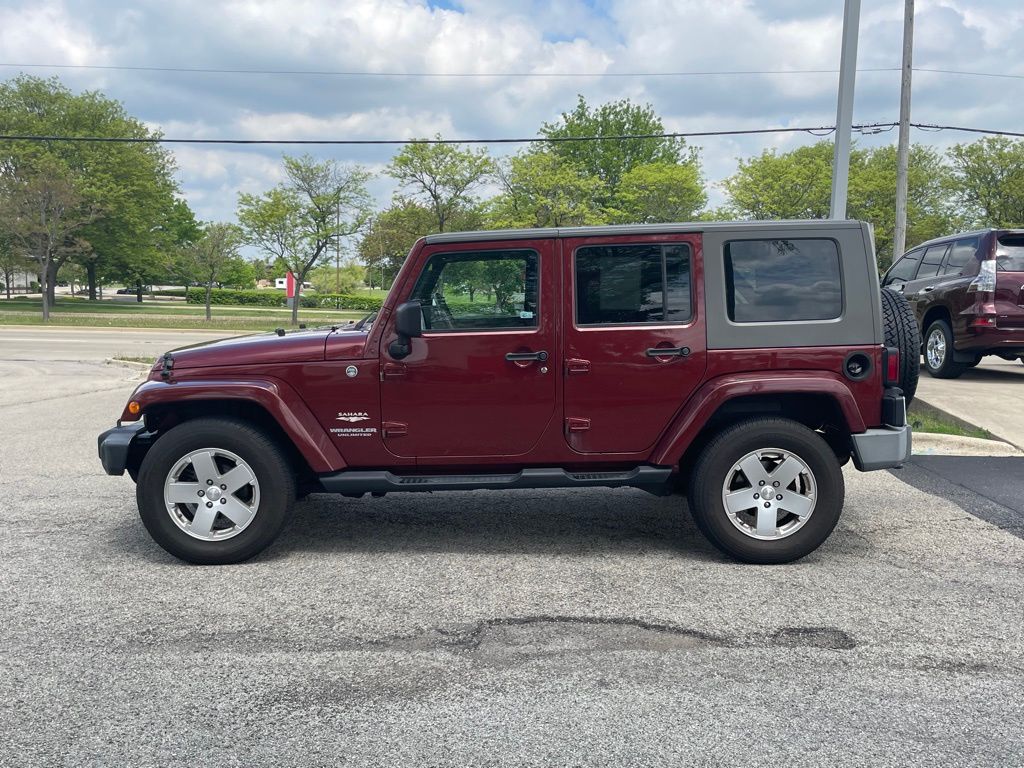 Used 2010 Jeep Wrangler Unlimited Sahara with VIN 1J4BA5H13AL102953 for sale in Aurora, IL