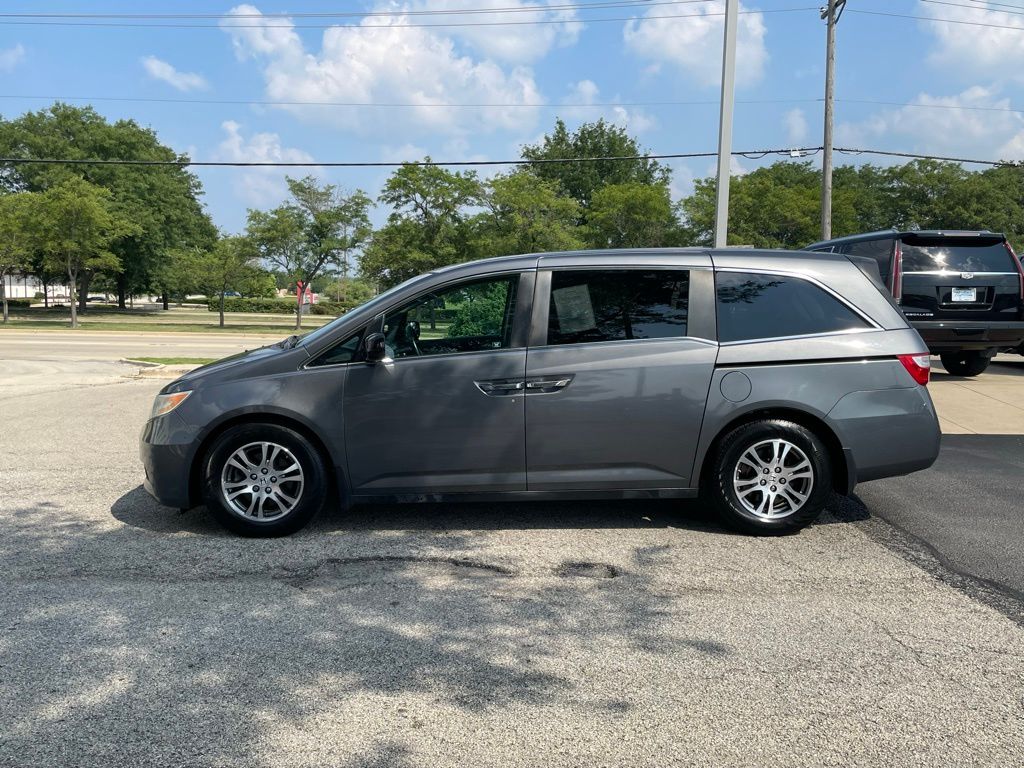 Used 2012 Honda Odyssey EX-L with VIN 5FNRL5H62CB116259 for sale in Aurora, IL