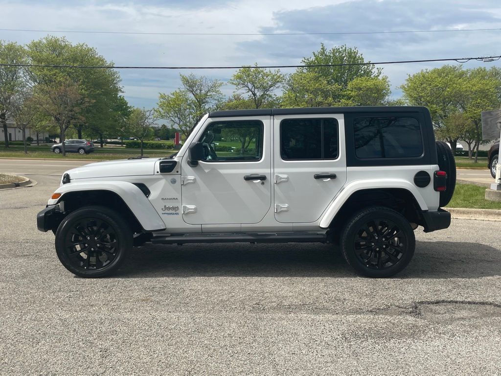 Used 2021 Jeep Wrangler Unlimited Sahara 4XE with VIN 1C4JJXP62MW730628 for sale in Aurora, IL
