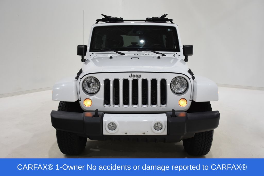 Used 2016 Jeep Wrangler Unlimited Sahara with VIN 1C4BJWEG7GL101737 for sale in Urbana, IL