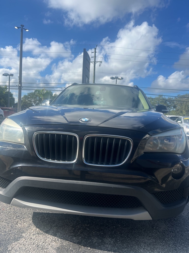 Used 2014 BMW X1 28i with VIN WBAVM1C59EVW55093 for sale in Palm Beach Gardens, FL