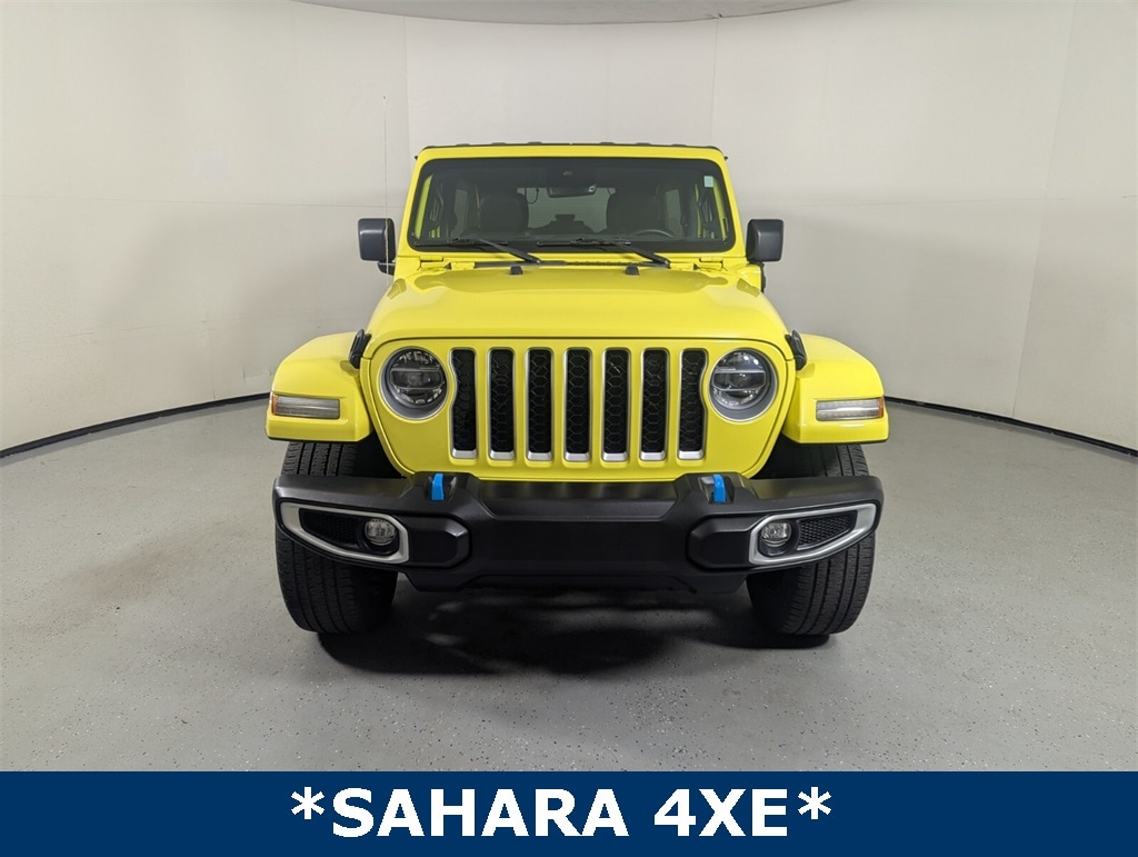 Used 2022 Jeep Wrangler Unlimited Sahara 4XE with VIN 1C4JJXP68NW276404 for sale in Lake Park, FL
