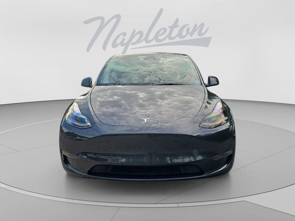 Used 2024 Tesla Model Y Long Range with VIN 7SAYGDED4RF095827 for sale in Orlando, FL