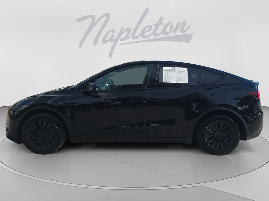 Used 2024 Tesla Model Y Long Range with VIN 7SAYGDEE2RA245813 for sale in Orlando, FL