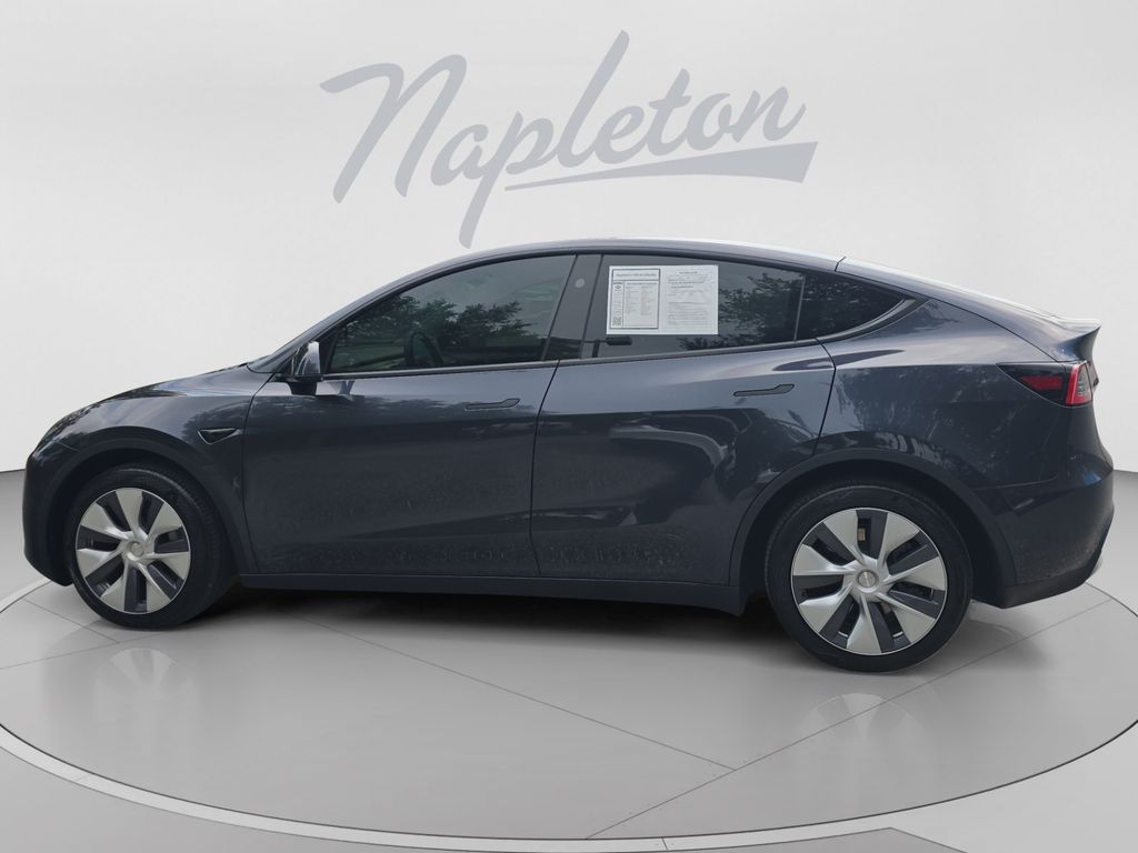Used 2024 Tesla Model Y Long Range with VIN 7SAYGDEE6RA247855 for sale in Orlando, FL