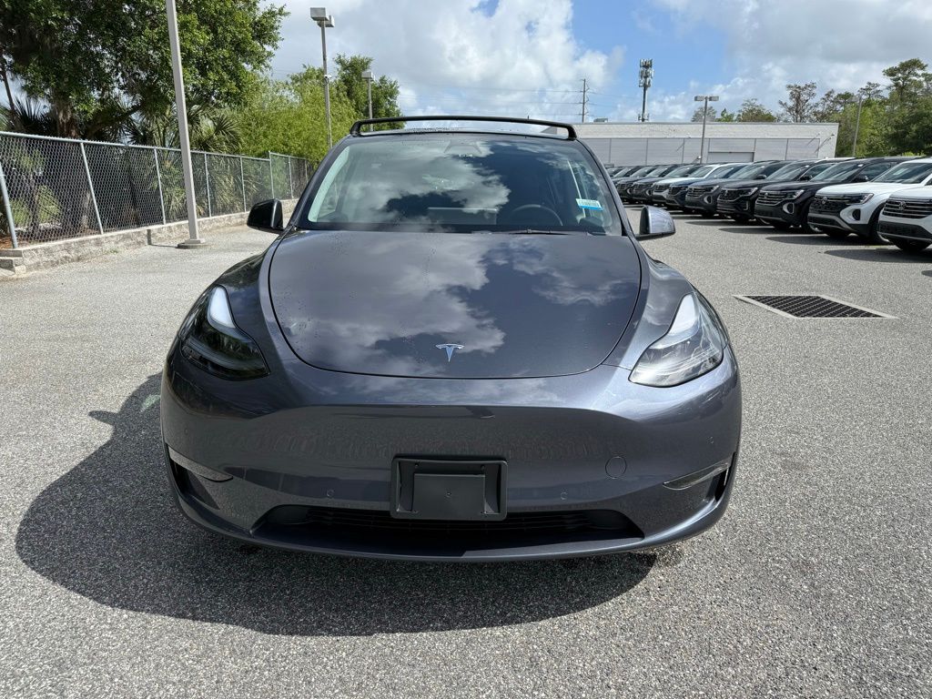 Used 2022 Tesla Model Y Long Range with VIN 7SAYGDEE9NF310315 for sale in Orlando, FL