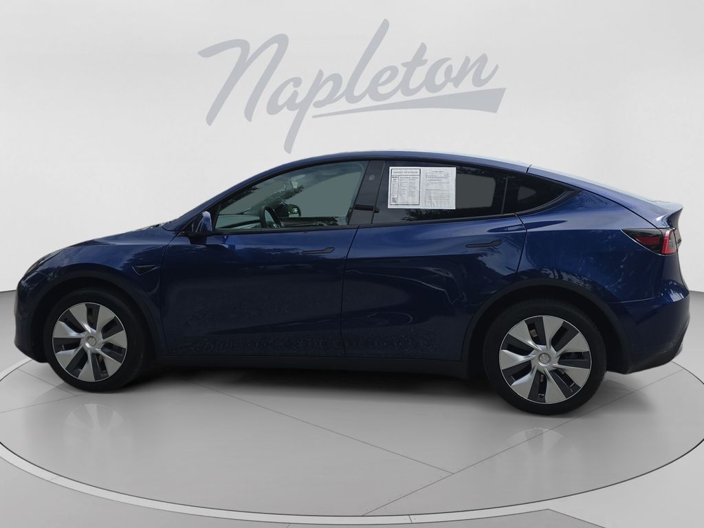 Used 2024 Tesla Model Y Long Range with VIN 7SAYGDEE6RF988123 for sale in Orlando, FL