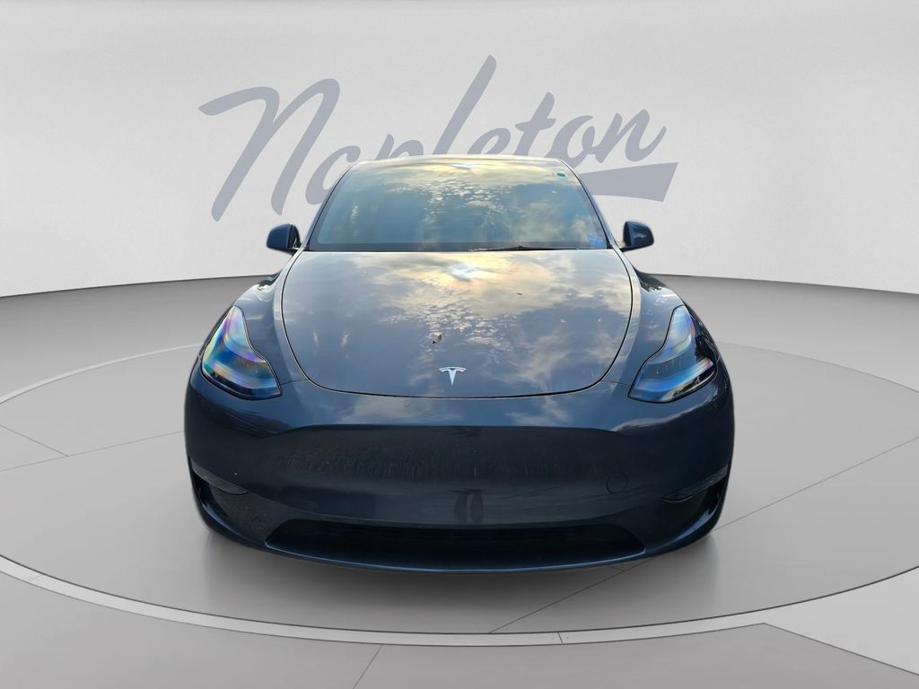 Used 2023 Tesla Model Y Long Range with VIN 7SAYGDEE4PA201101 for sale in Orlando, FL