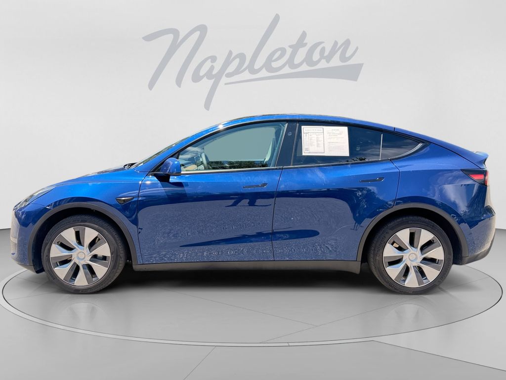 Used 2024 Tesla Model Y Long Range with VIN 7SAYGDEE6RF988123 for sale in Orlando, FL