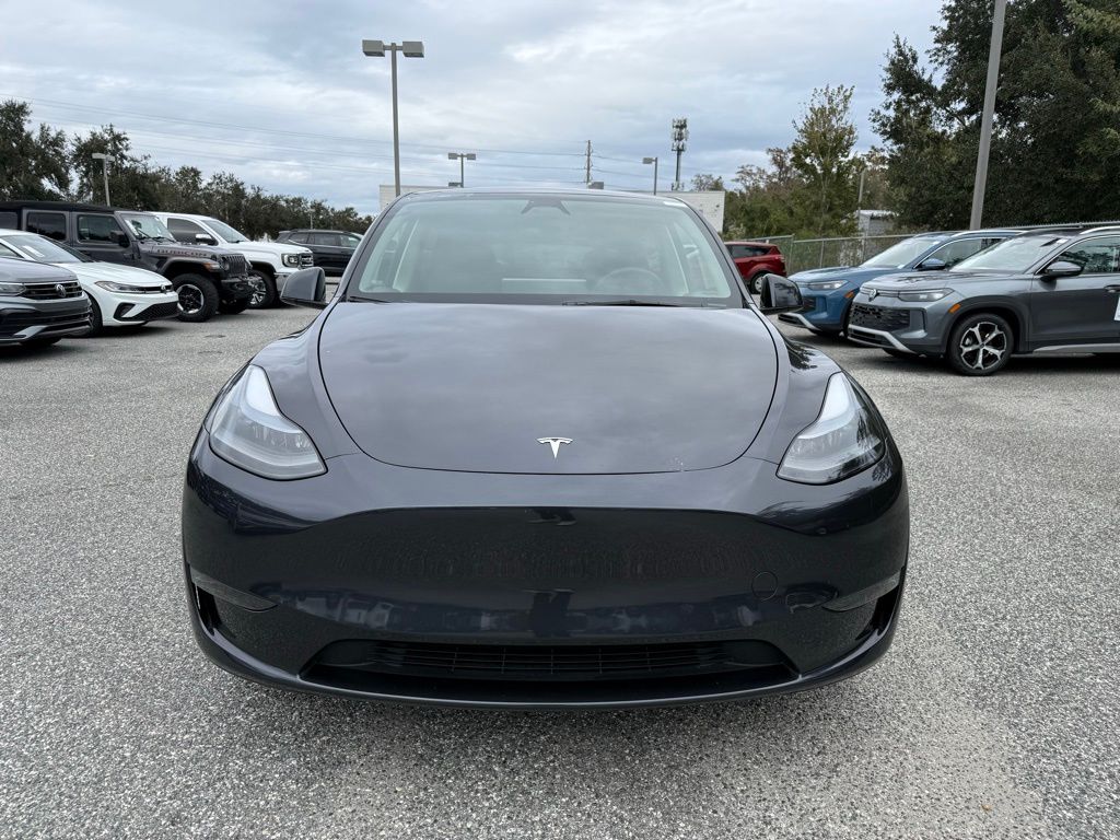 Used 2024 Tesla Model Y Long Range with VIN 7SAYGDED5RF092631 for sale in Kansas City