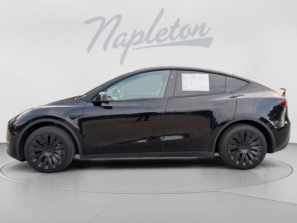 Used 2024 Tesla Model Y Long Range with VIN 7SAYGDEE2RA245813 for sale in Orlando, FL