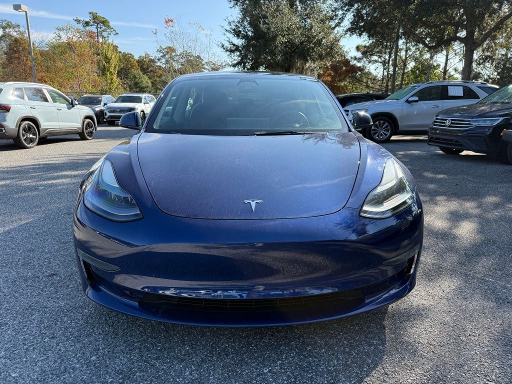 Used 2023 Tesla Model 3 Base with VIN 5YJ3E1EA4PF402041 for sale in Orlando, FL