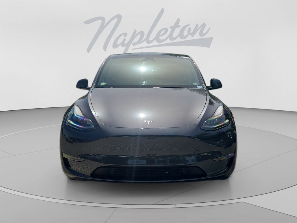 Used 2024 Tesla Model Y Long Range with VIN 7SAYGAEE2RF101518 for sale in Orlando, FL