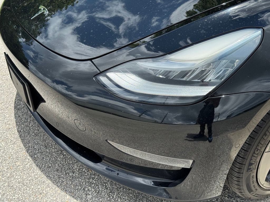 Used 2018 Tesla Model 3 Long Range Dual Motor with VIN 5YJ3E1EBXJF067948 for sale in Orlando, FL