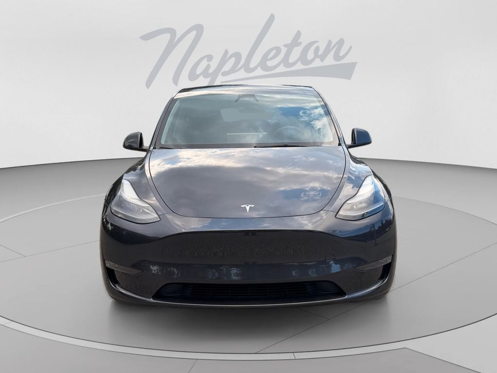 Used 2024 Tesla Model Y Long Range with VIN 7SAYGDEE6RA247855 for sale in Orlando, FL