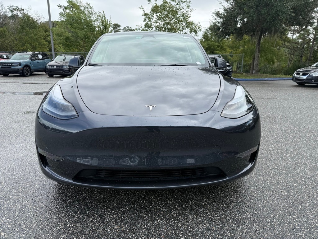 Used 2024 Tesla Model Y Long Range with VIN 7SAYGDED7RF095465 for sale in Orlando, FL