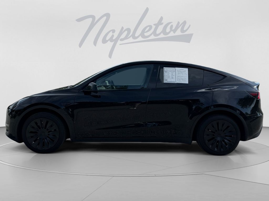 Used 2024 Tesla Model Y Long Range with VIN 7SAYGDEE2RA245813 for sale in Orlando, FL