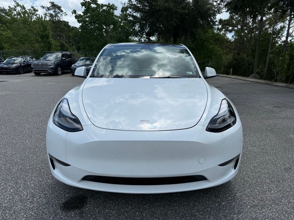 Used 2024 Tesla Model Y Long Range with VIN 7SAYGDEE9RA263144 for sale in Orlando, FL
