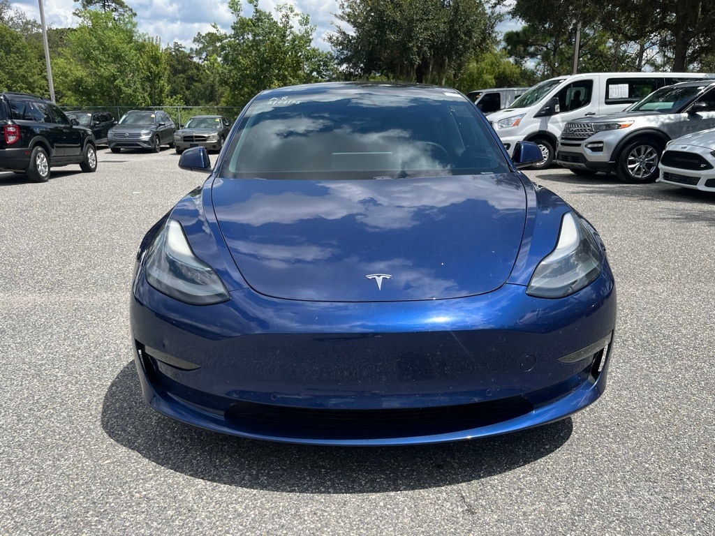 Used 2021 Tesla Model 3 Base with VIN 5YJ3E1EB5MF049121 for sale in Orlando, FL