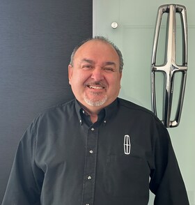 Staff member George Egan from ID_d9a074fd2bd6