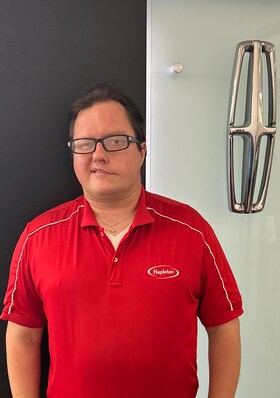 Staff member Lukasz Swiderski from ID_327e6dc8bf34