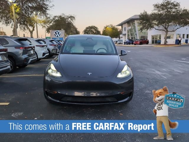 Used 2024 Tesla Model Y Long Range with VIN 7SAYGDED2RF093090 for sale in Sanford, FL