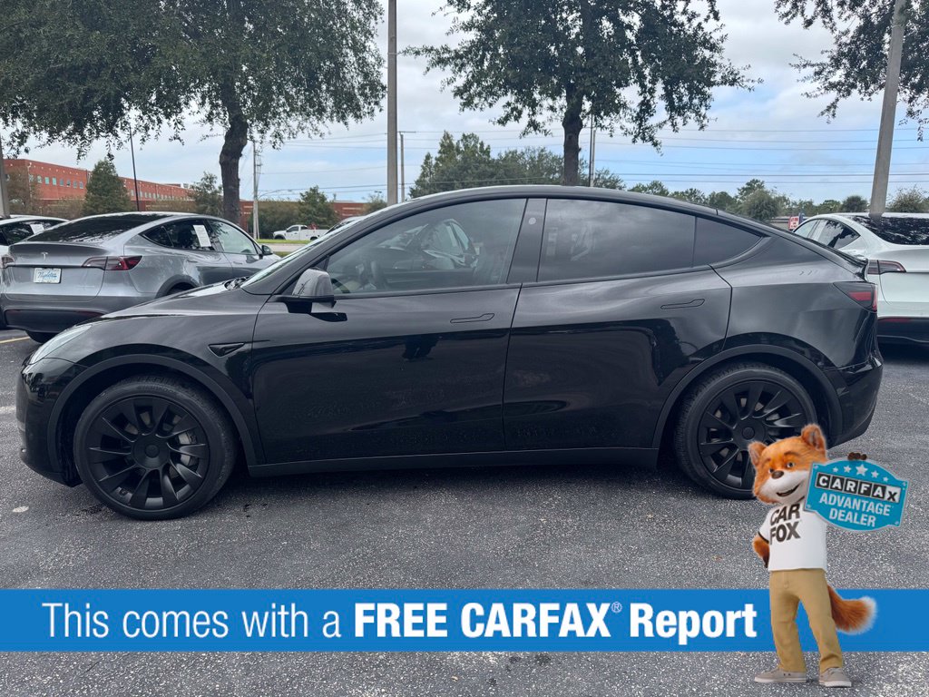 Used 2024 Tesla Model Y Long Range with VIN 7SAYGAEE7RF982040 for sale in Sanford, FL